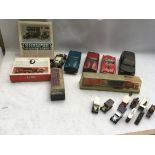 A collection of boxed and loose Diecast vehicles i