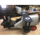 Unusual vintage aluminium and wood child's sit in or push along biplane with propeller turning