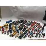 A box containing a collection of loose playworn Diecast vehicles including Matchbox, Corgi, Dinky,