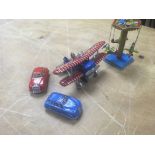 A collection of reproduction tinplate toys