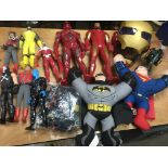 A box containing a collection of figures including Marvel, Captain Scarlet, Batman etc