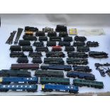 A box containing a collection of loose Hornby railways, OO scale, including Locomotives and tenders,