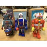 Robots, boxed tinplate clockwork including Musical