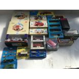 A collection of boxed Diecast vehicles including C