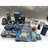 A collection of boxed Dr Who toys including Corgi