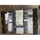 A box containing a large number of ps2 and PSP games.