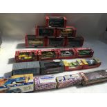 A collection of boxed Diecast and plastic vehicles including Saico sports car collection x6, Mercury