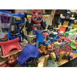 A collection of loose Imaginext toys including Batman, Spiderman, Transformers etc