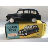 Corgi toys, #418 Austin taxi, boxed end flap missing