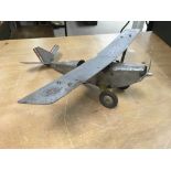 A tinplate aircraft, unmarked, could possibly be f
