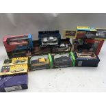 A collection of boxed Diecast vehicles including,