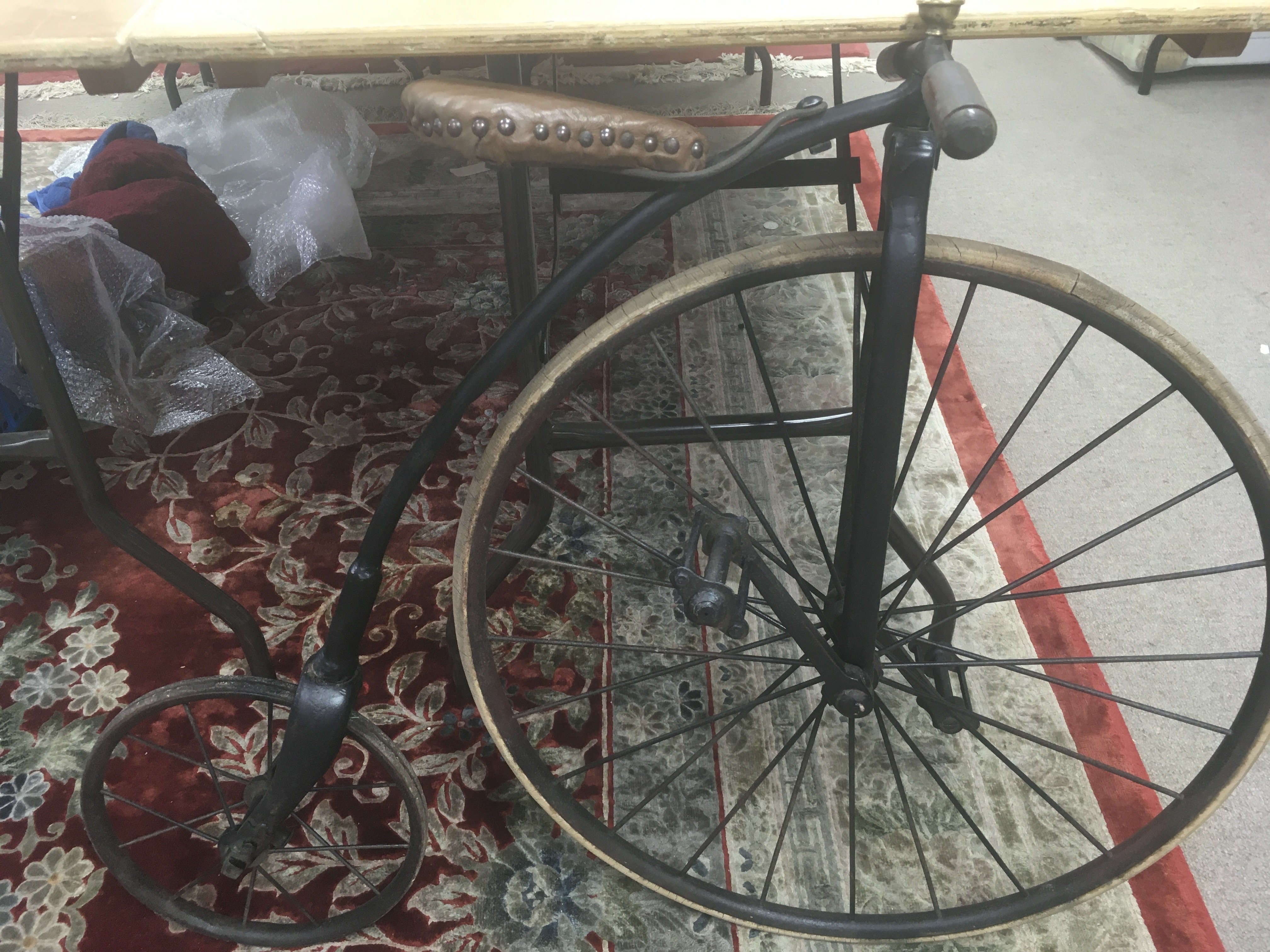 Old Iron child's Penny Farthing bicycle with solid tyres and wood and leather saddle - Image 2 of 2