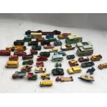 A collection of loose Diecast vehicles including L