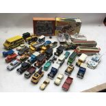 A collection of loose Diecast vehicles including L