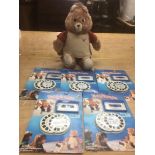 Teddy Ruxpin bear along with 5x carded picture shows with cassettes