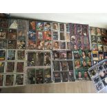 A collection of trading cards, some sets including