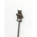 A Victorian silver stickpin in the form of a bear