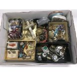 A box of costume jewellery and other items.