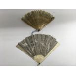 A carved and pierced horn fan c.1900 and a carved bone and lace fan - NO RESERVE