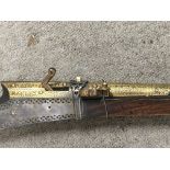 An interesting19th century or earlier Jezail matchlock rifle with white metal mounts and gold