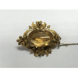 A unmarked Victorian brooch set with large cut cit