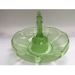 An Art Deco style green glass centrepiece with female figure to the centre.