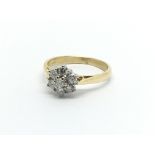 An 18carat gold ring set with a pattern of brillia