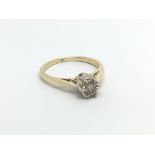 An 18carat gold ring set with a Cape diamond Appro