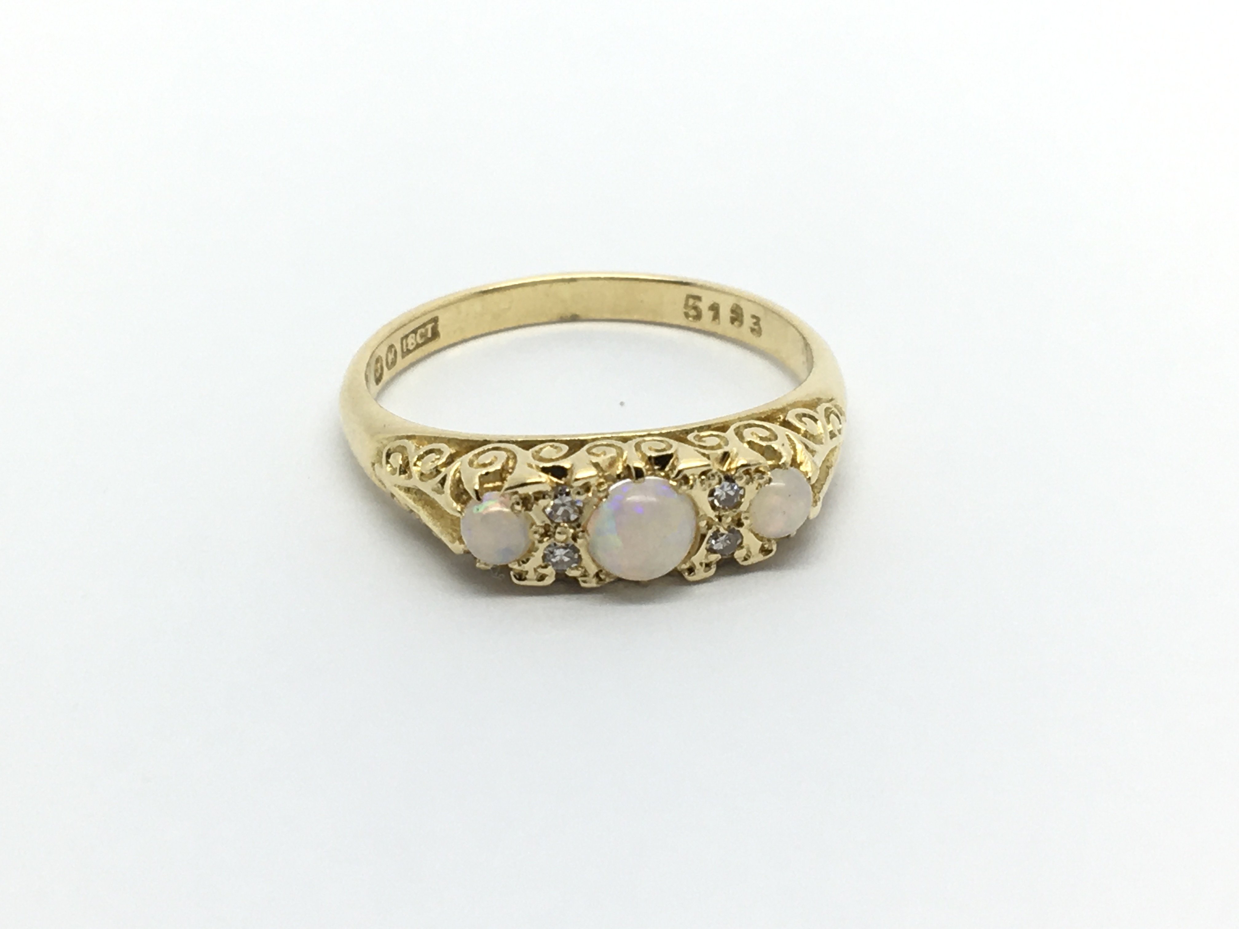 A 1950s 18carat gold ring set with Opals ring size