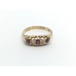 An Vintage 18carat gold ring set with ruby and dia