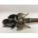 A wooden staff surmounted with a brass eagle, poss