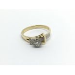 An 18carat gold ring set with diamonds and in the