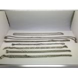Seven silver necklaces, approx 110g.
