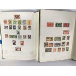 Two stamp albums containing Australian and New Zealand stamps.