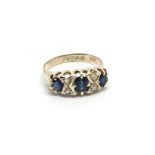 An Edwardian 9carat gold ring set with three good