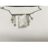 A Art Deco style necklace with drop pendants .