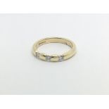 An 18carat yellow gold ring inset with three brill