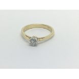 An 18carat carat gold ring set with a solitaire di
