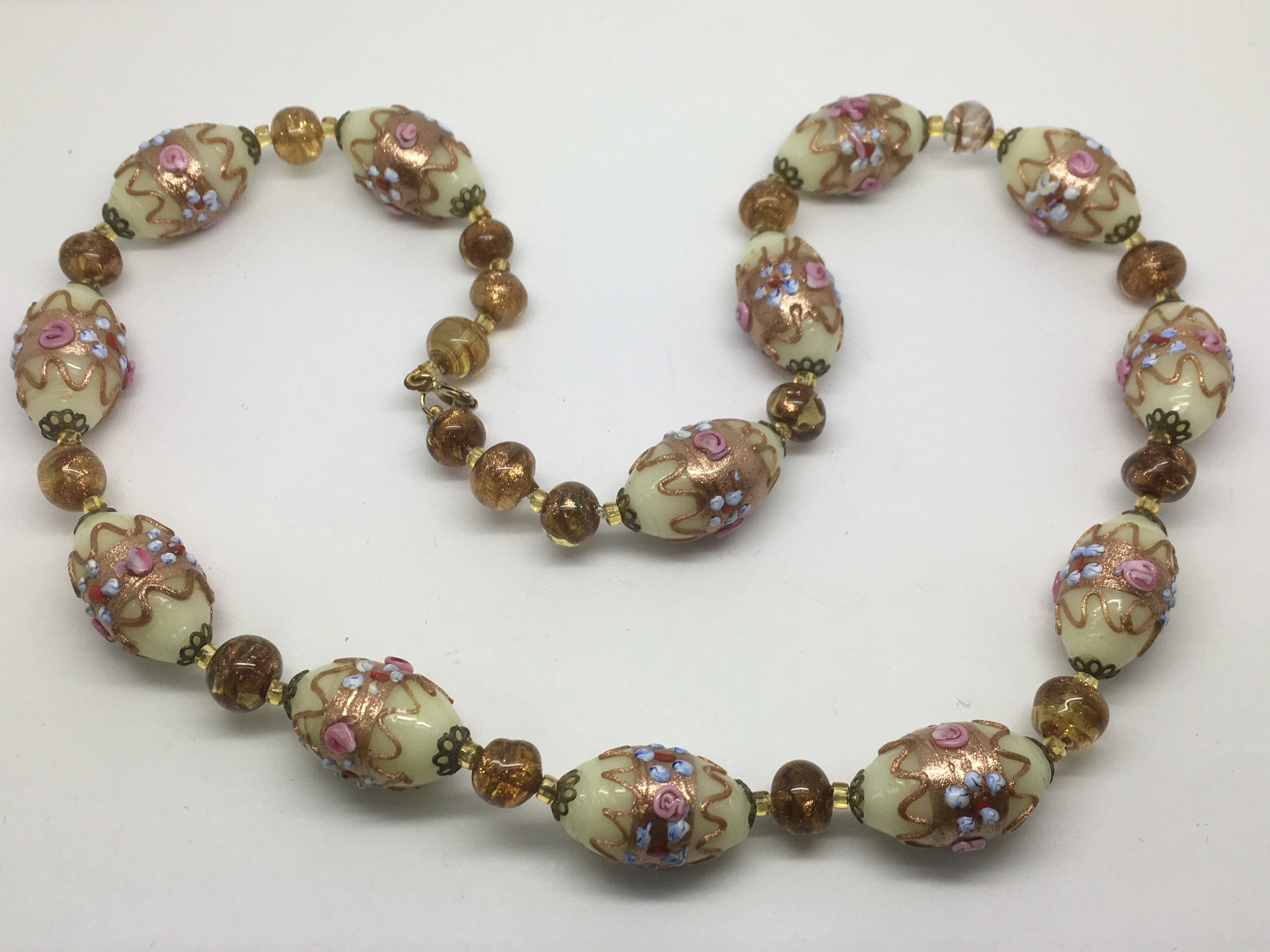 A decorative restrung Venetian bead necklace.