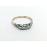 A 9carat gold ring set with three diamonds approximately 0.25 of a carat ring size P.