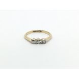 A Vintage 18carat gold ring set with three diamond