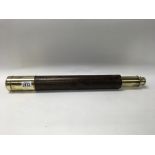 A McKenzie brass and leather covered telescope. Fu