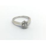 An 18carat white gold ring set with a brilliant cut diamond colour G-H and of good clarity the