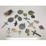 A collection of religious pendants including some