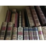 A collection of leather bound books books including History of England and Tennysons works .