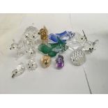 A collection of cut glass animal figures including