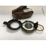 A WW1 brass military MK II Verner compass with mother of pearl and painted face, and leather case.
