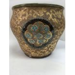 A Doulton jardiniere decorated with stylised flowers .25 cm - NO RESERVE