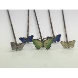Another five silver and enamel butterfly hatpins.