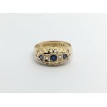 A 1920s 18carat gold ring set with three sapphire